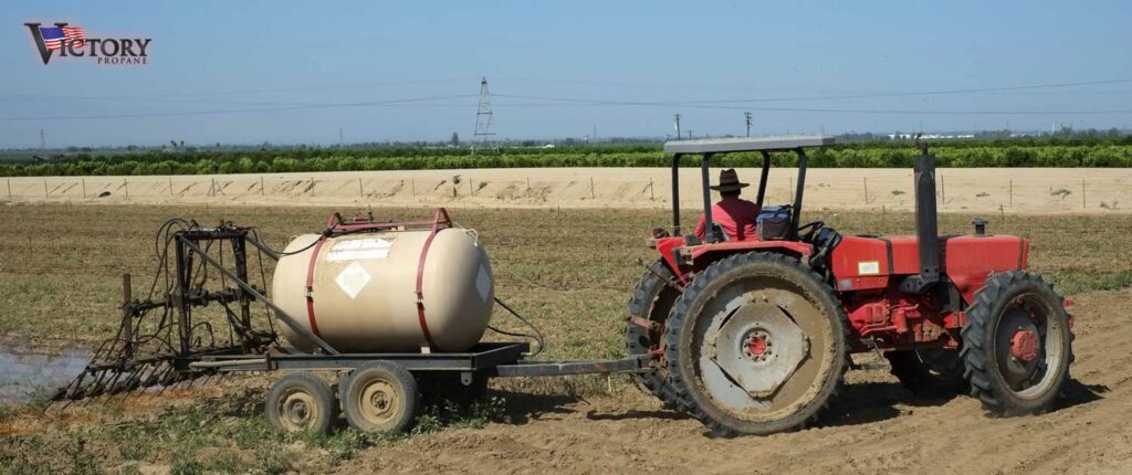 tractor pulling a trailer with a tank